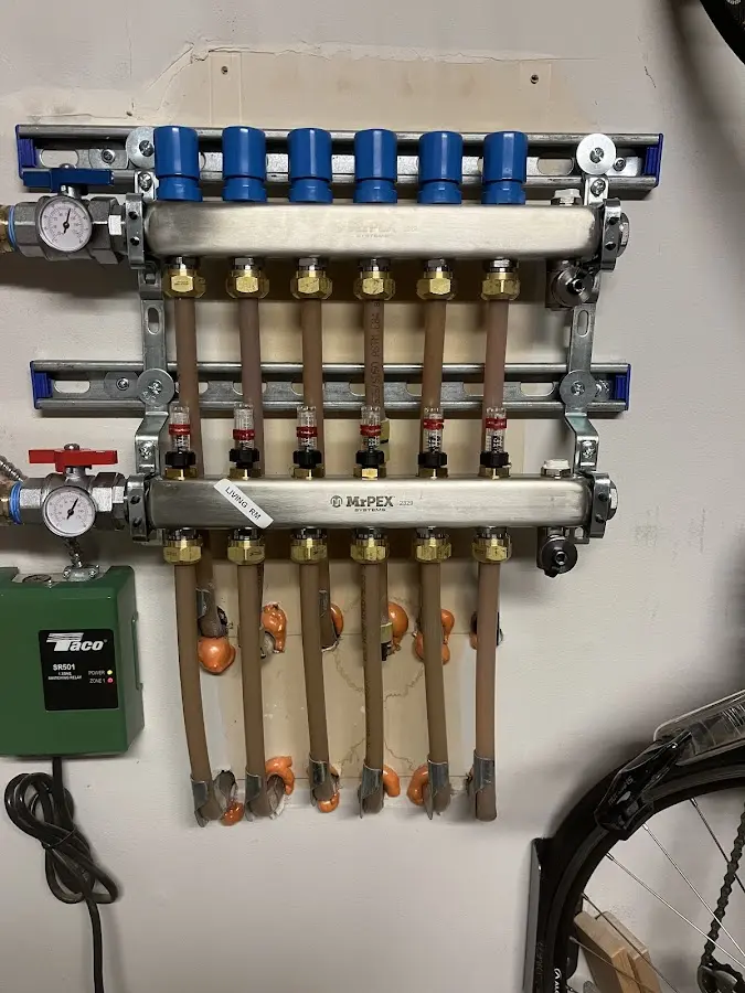 Plumber performing Leak Detection at a residential property in Versailles